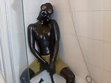 Young Latex Fetish Girl Fully Rubberized With Pisspants And Gasmask