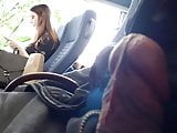 cumflash next to brunette girl in bus
