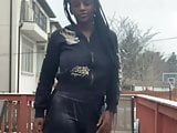 Sexy ebony slut showing her tight ass in leather leggings!!