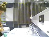 ip cam young girl - bathroom brushing teeth